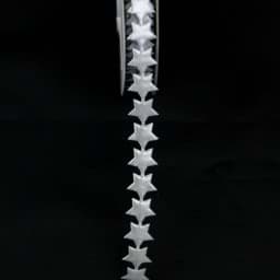 Bild von Silberne Sterne am Band - 15mm Durchmesser - 10m Rolle