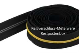 Bild von Restpostenbox 5mm Endlosreißverschluss - schwarz mit goldener Spirale - 25m