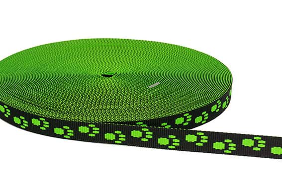 Bild von 25m Rolle Pfötchengurtband - Farbe: Schwarz / Neongrün - 15mm breit